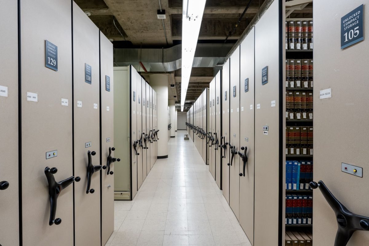 A library archive with organized compact shelving
