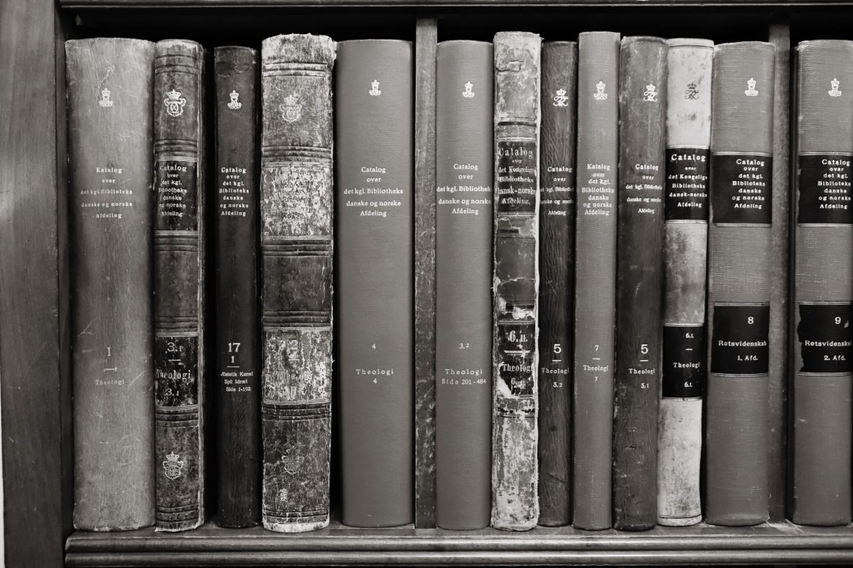 Antique books on a library shelf