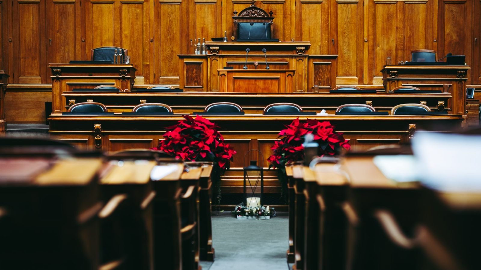 A wooden courtroom interior with empty seats in Bern, Switzerland