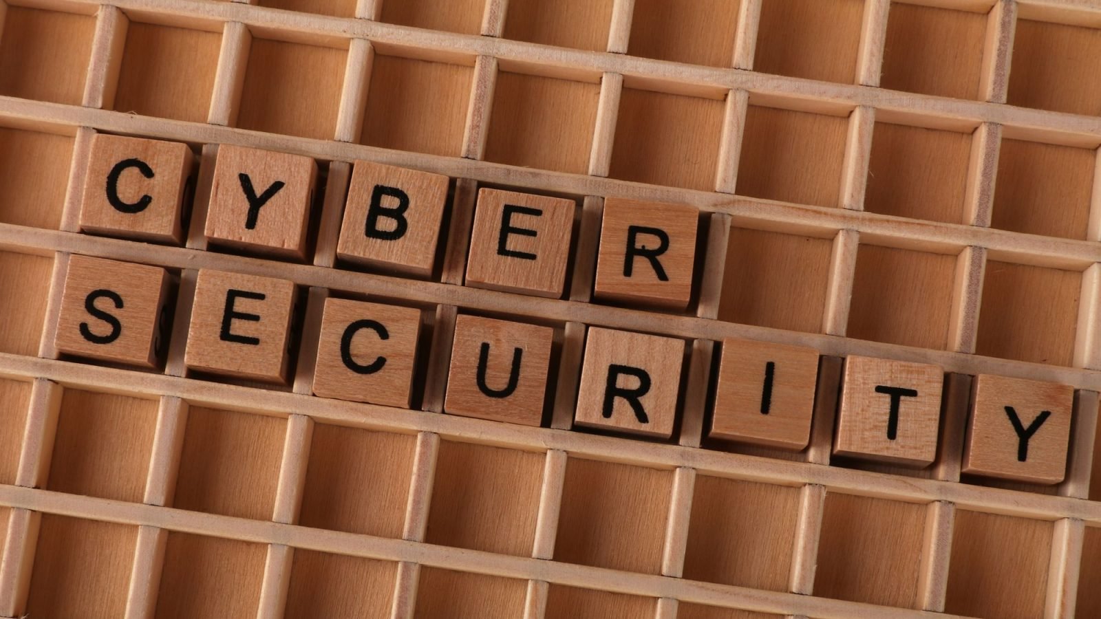 Wooden letter blocks spelling cyber security