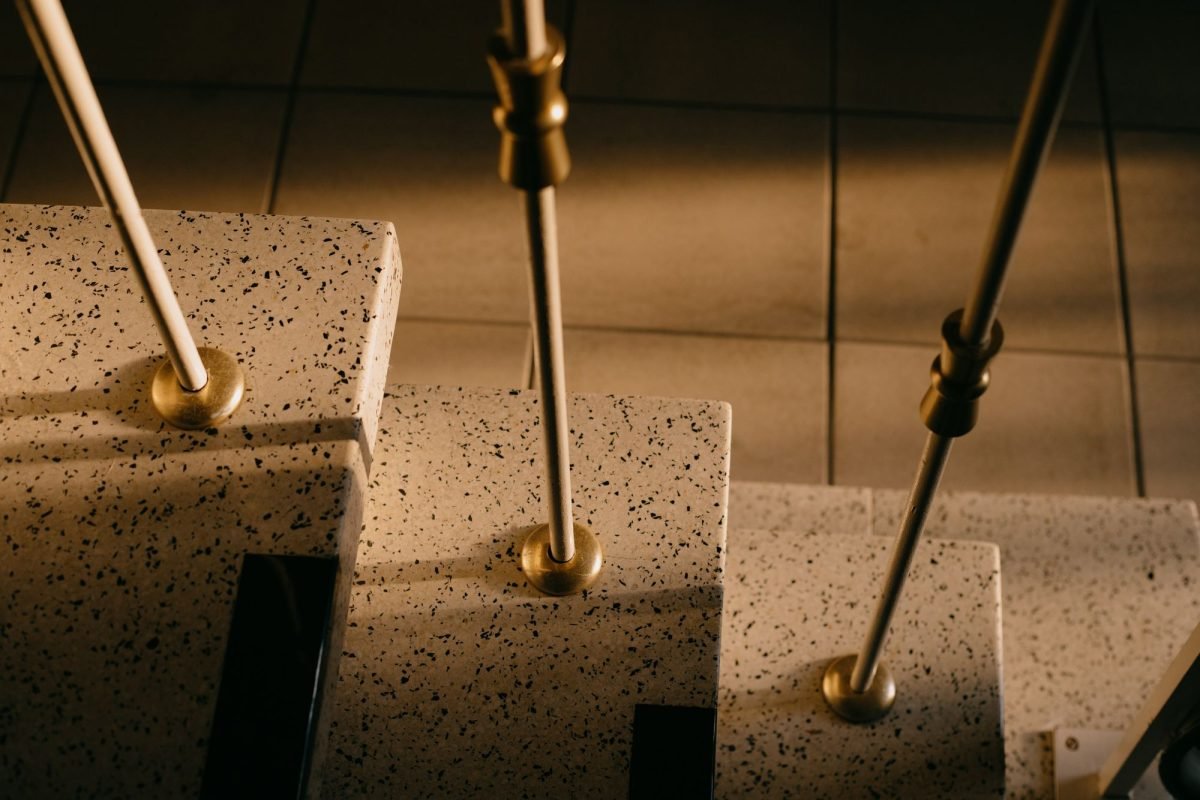 Marble steps with a steel handrail