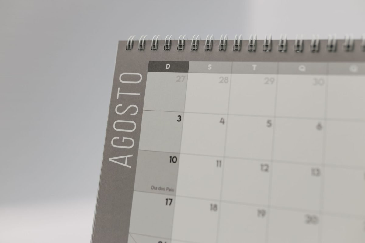A spiral-bound calendar page showing August
