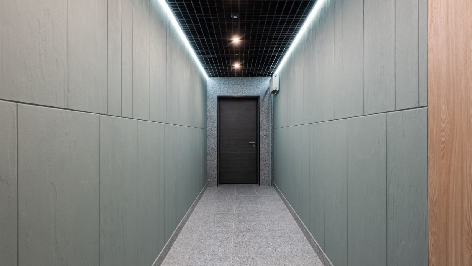 A long empty corridor in a modern office